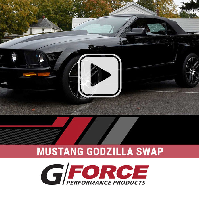 Godzilla stuffed Ford Mustang